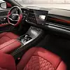 Interieur des BYD Han EV mit roten Ledersitzen und dem Infotainment HiCar