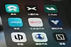 Shanghai,China-July 24th 2023: BYD, AION, NIO, Xpeng, Li Auto, Leapmotor, Neta, Denza and Zeekr car App icons. Assorted Chinese EV brand logos